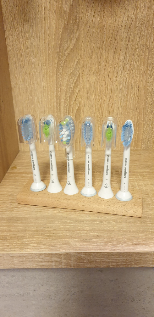 Toothbrush stand equipped